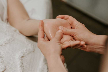 woman getting a hand massage