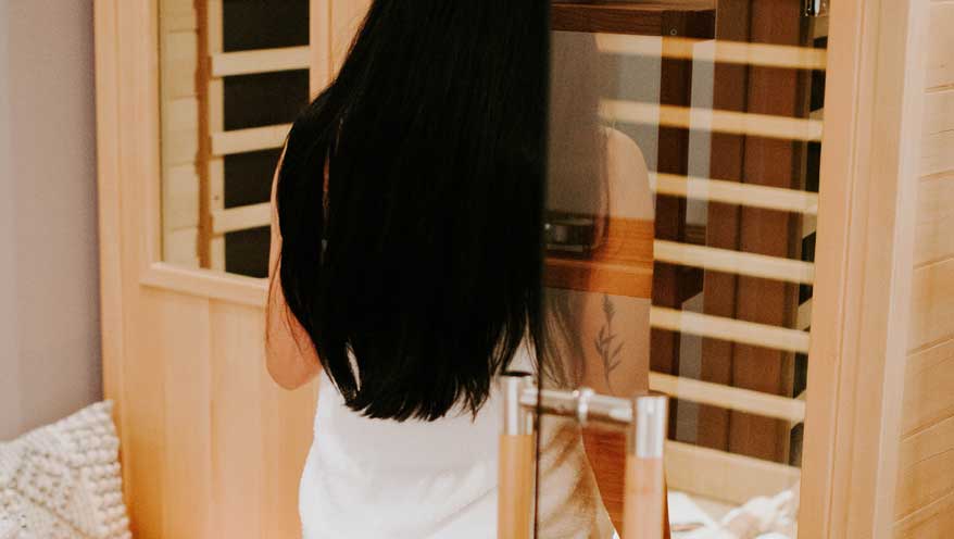 woman going into a sauna