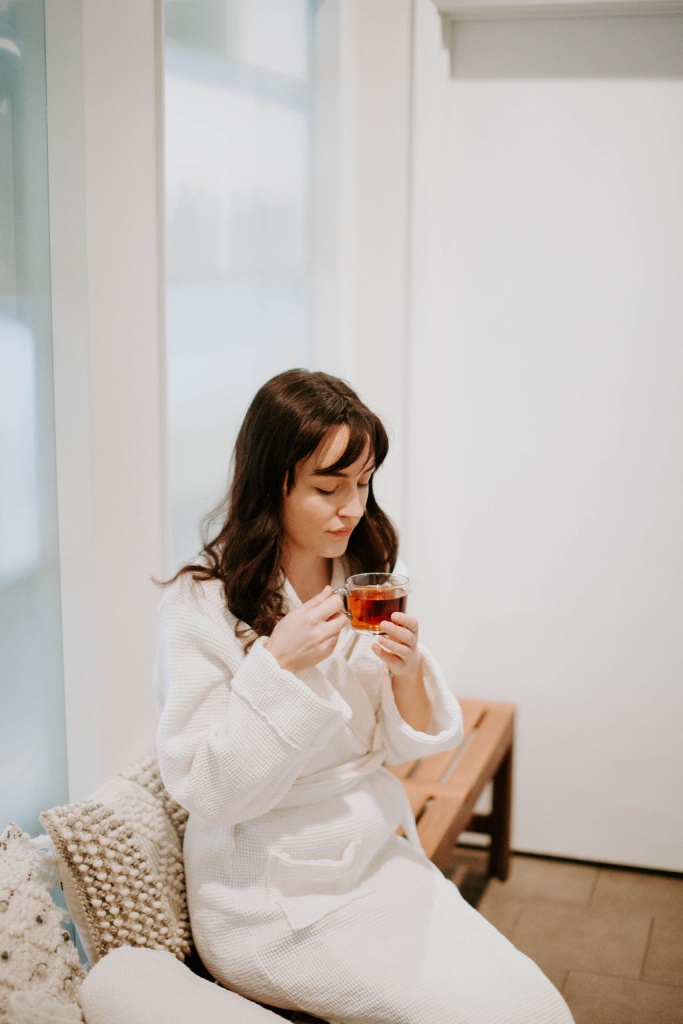 woman drinking a cup of tea